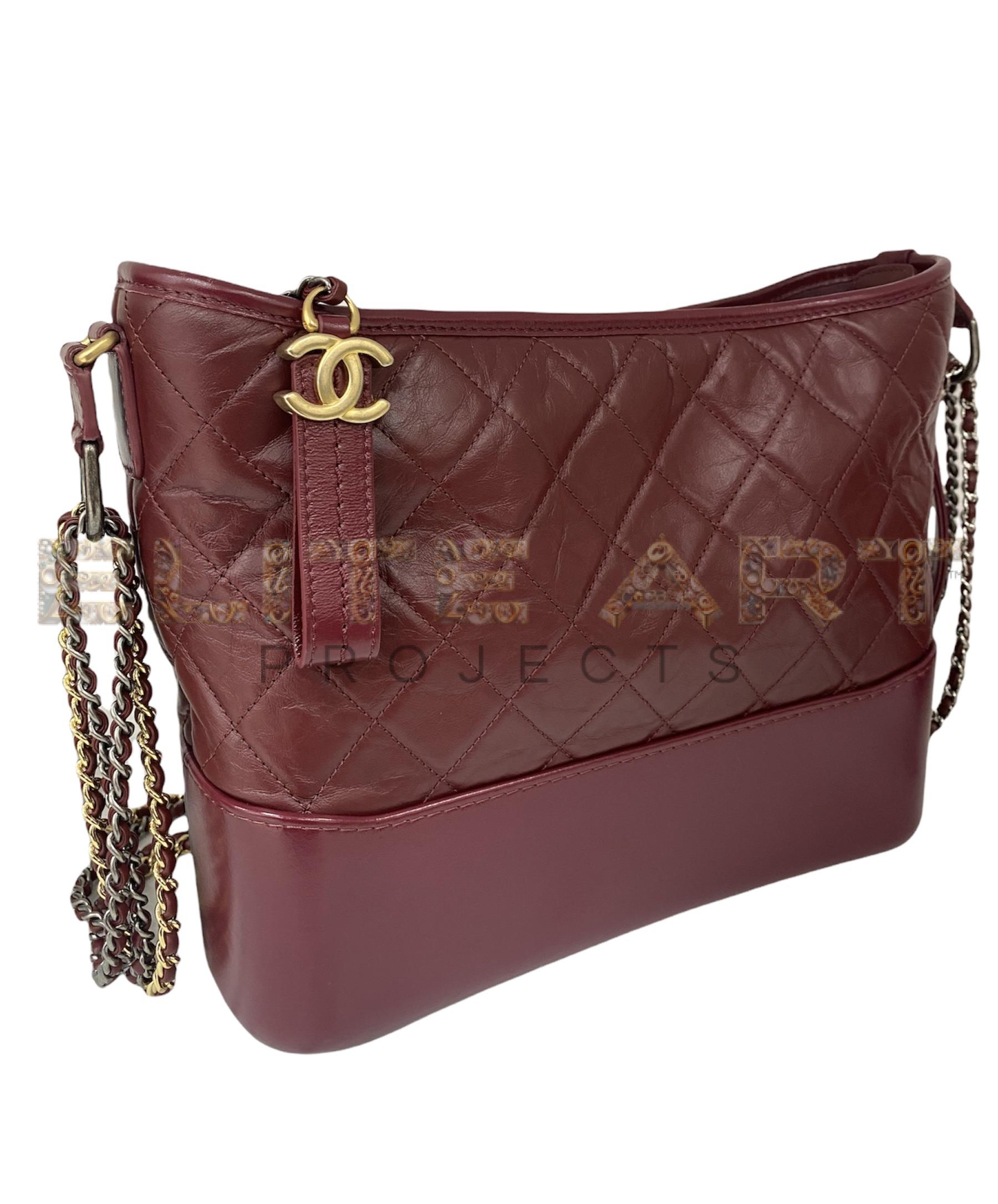 Chanel, Gabrielle bag, burgundy leather, silver hardware, gold hardware, spacious interior, shoulder strap