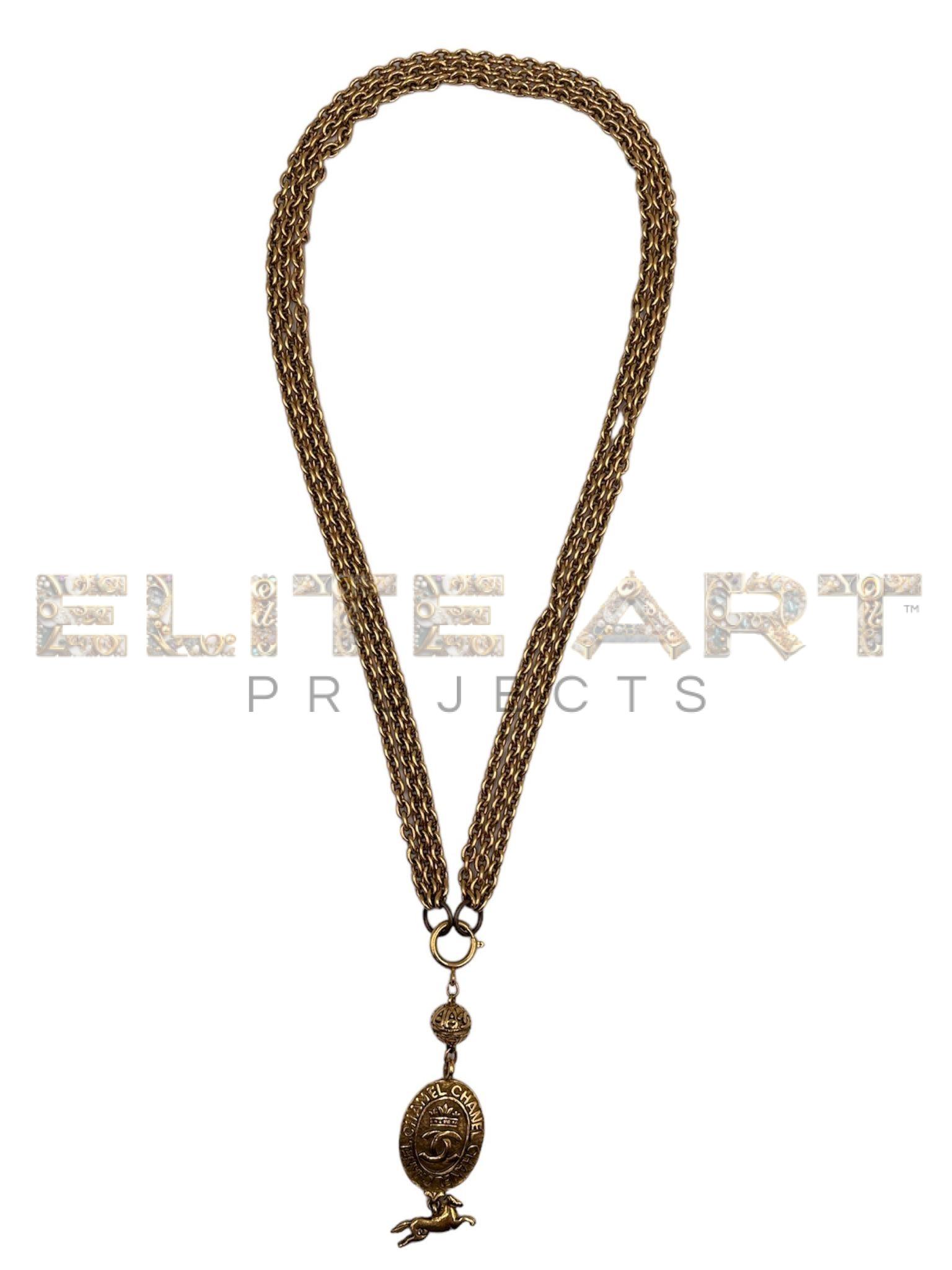 Chanel,necklace,gold-plated metal,narrow-link chains,removable pendant,decorative sphere,"CHANEL" logo medallion,"CC" logo pendant,83 cm length
