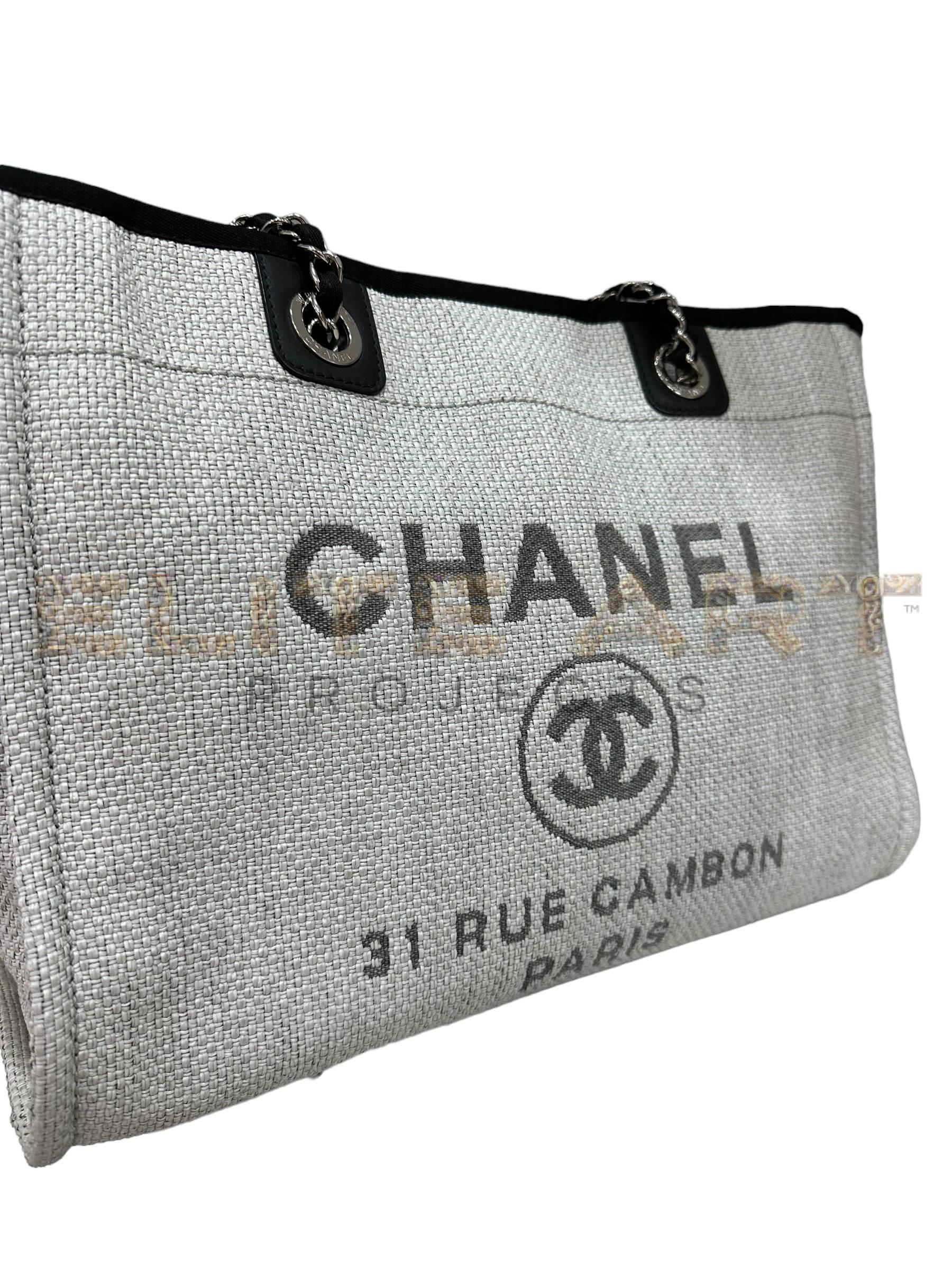 Deauville bag, light gray raffia, black fabric inserts, silver hardware, elegance