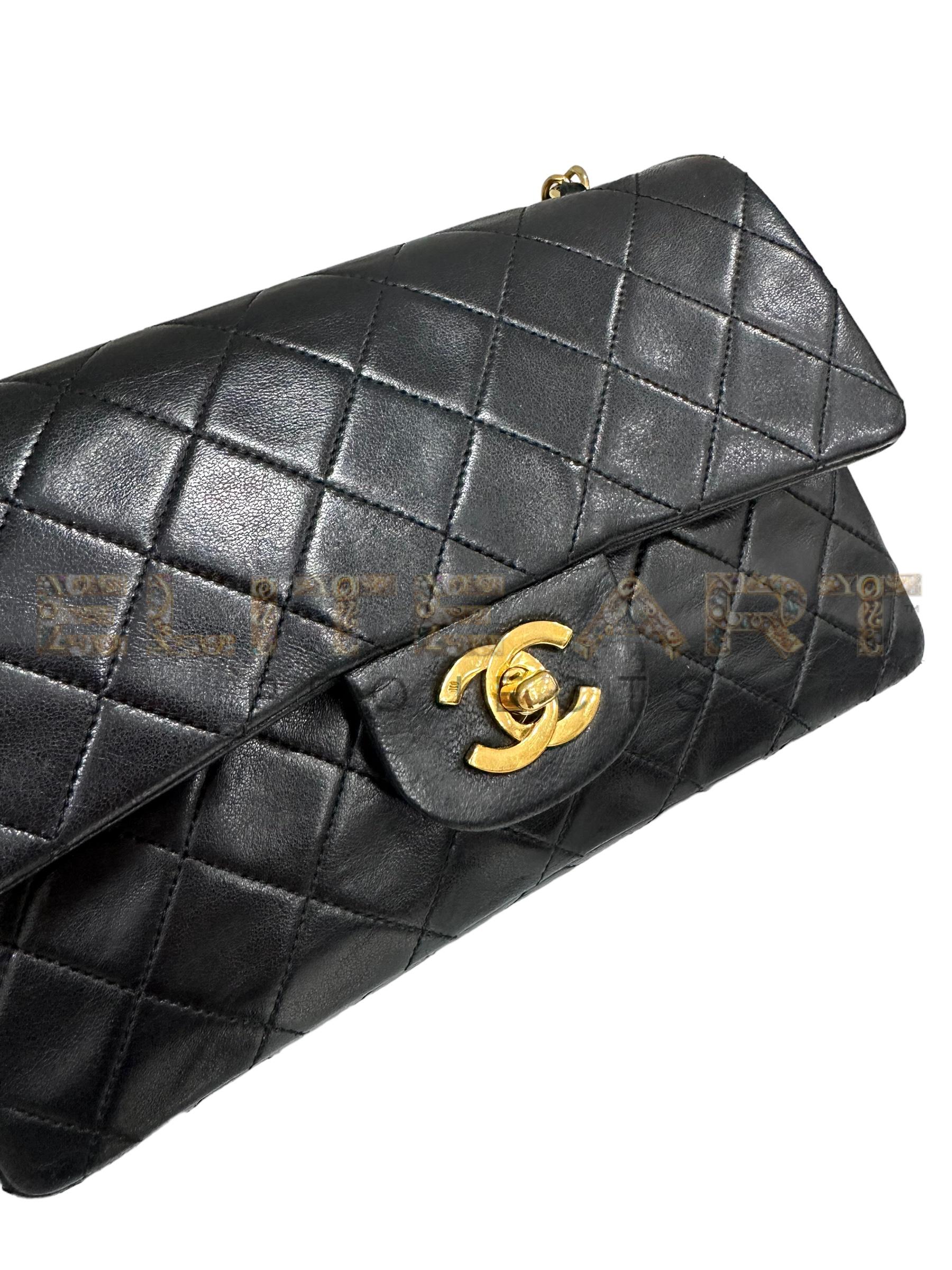 Chanel, Timeless bag, black leather, gold accents, double flap design, CC logo, Bordeaux interior