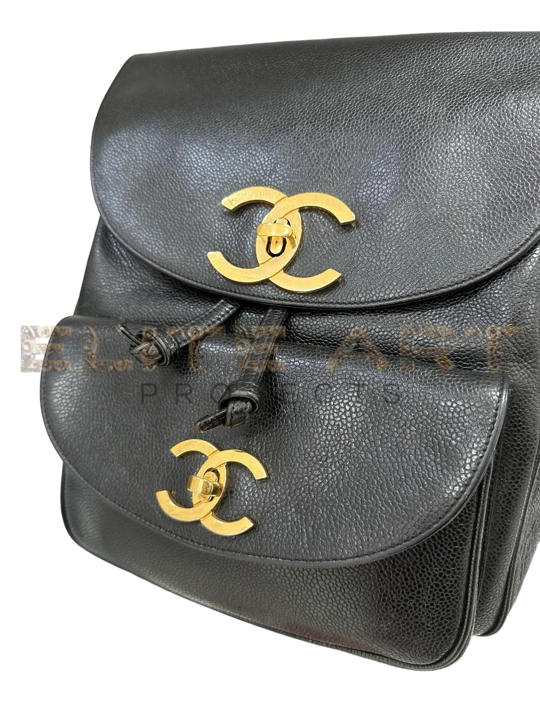 Vintage Big Logo, backpack, black hammered leather, gold accents, external flap, internal drawstring closure, spacious interior, multiple pockets, non-adjustable straps, 1994-1996