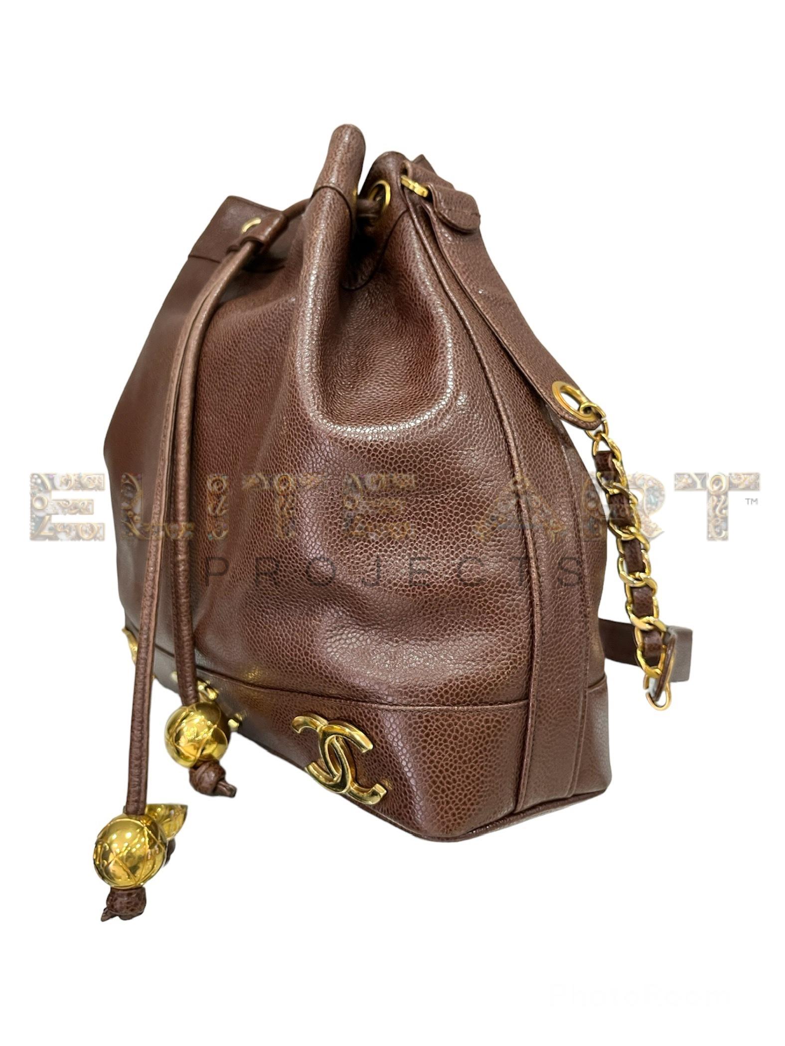 Chanel, vintage, bucket bag, brown leather, gold hardware, drawstring closure, spacious interior, 90s