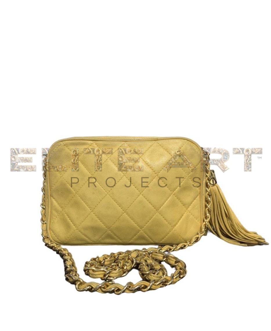Chanel, camera bag, yellow leather, gold accents, zip closure, spacious